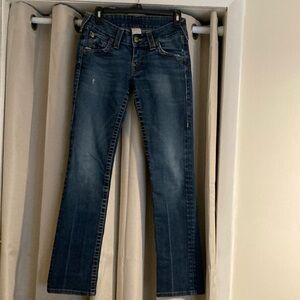 Women’s True Religion jeans, boot cut,  size 27 waist. Tag is faded in the back.